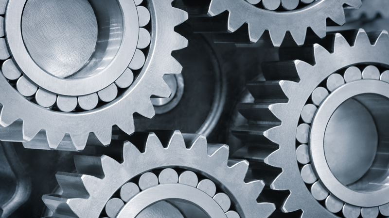 Predictive Maintenance: Anbau ohne Unterbrechung Zahnräder greifen ineinander - Predicitive Maintenance implementiert vorausschauende Instandhaltung für Sicherheit beim Anbau.